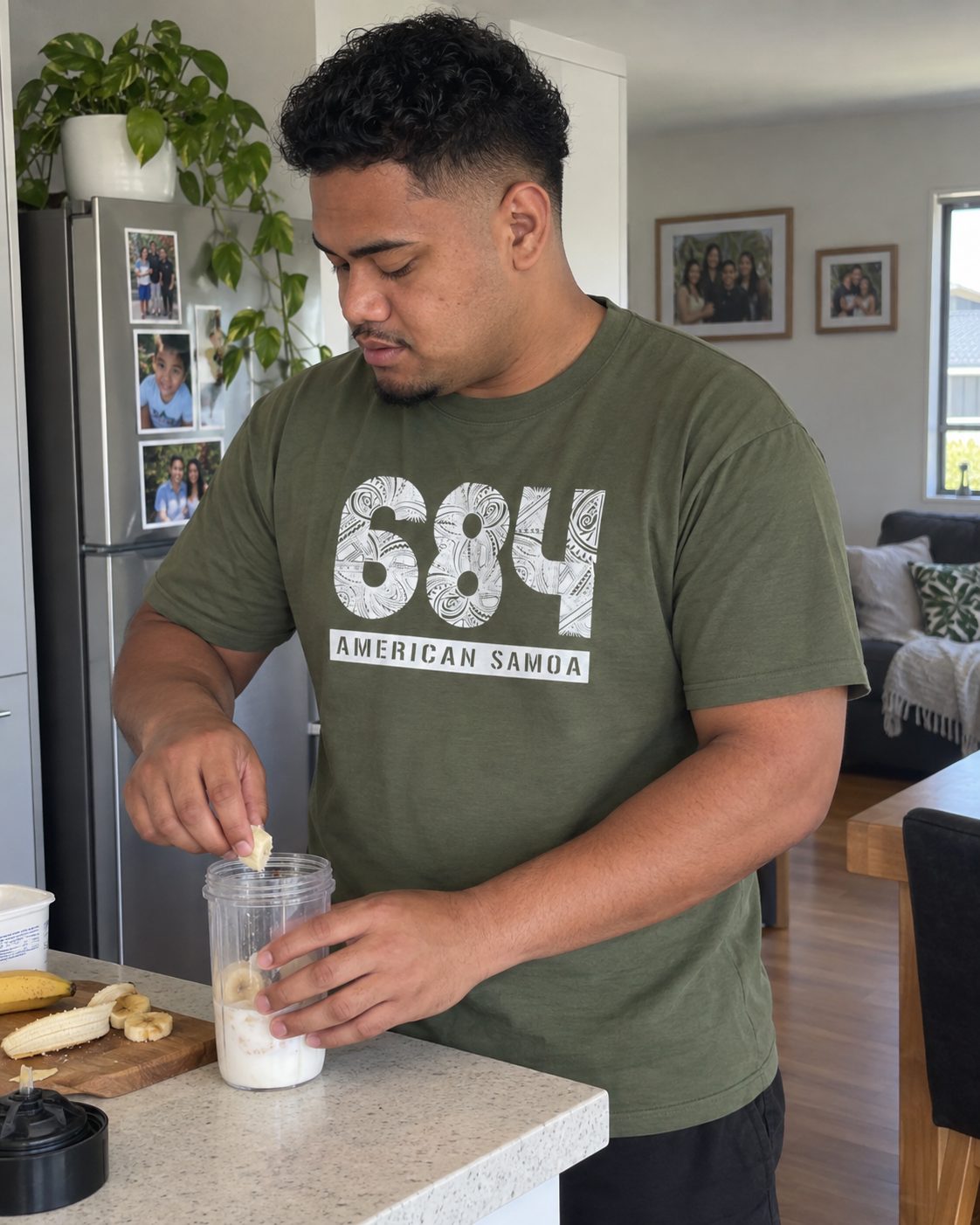 Unisex Tee in the 684 American Samoa print, worn at home on an ordinary day.