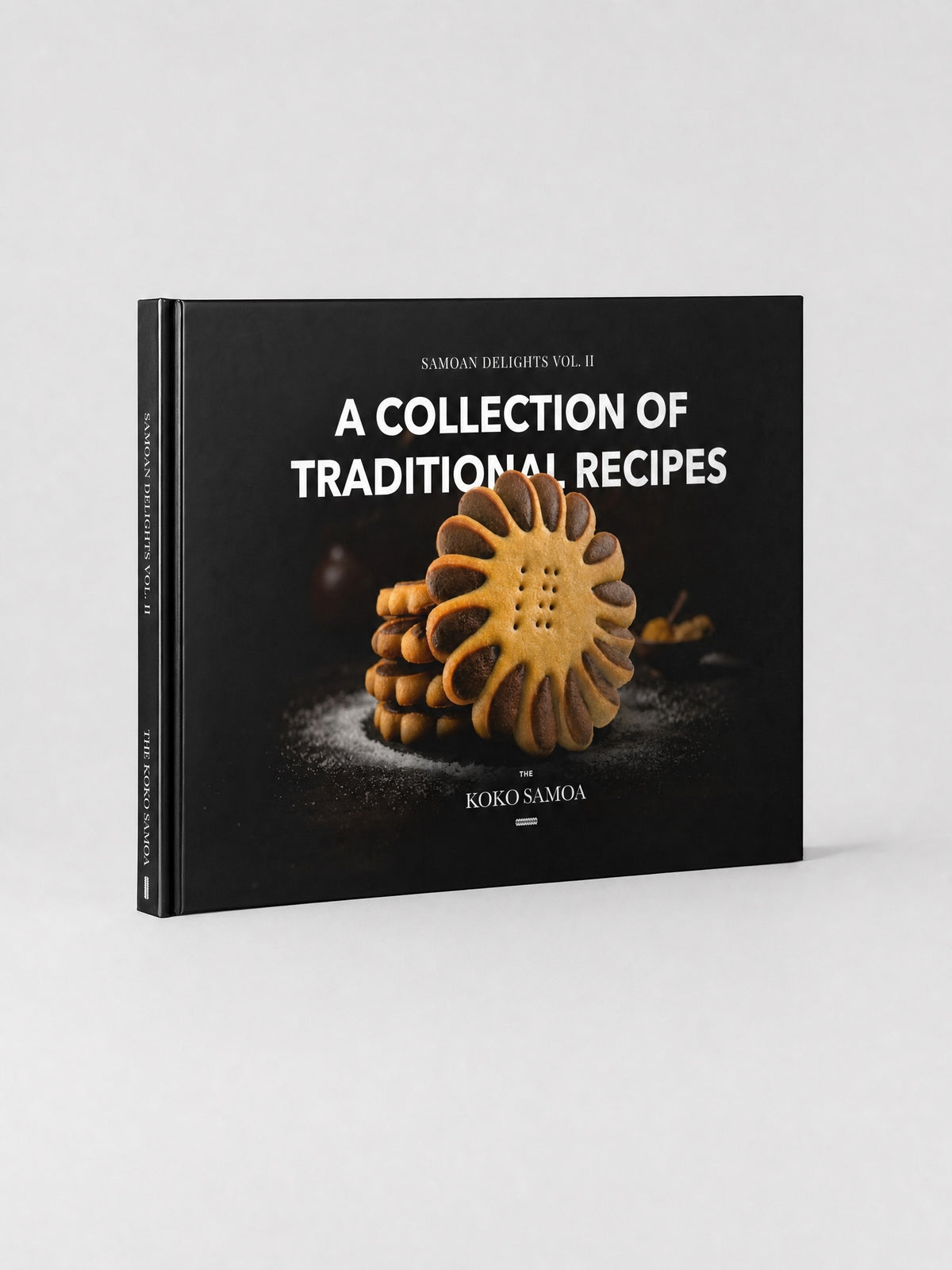 Hardcover A4 - Samoan Delights: 12 Samoan Recipes Cookbook - Vol 2 on a light grey studio background