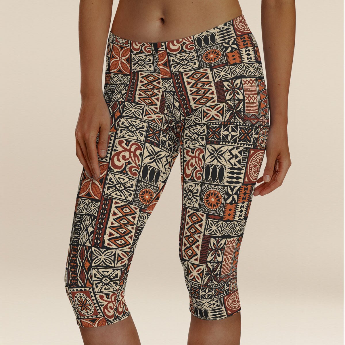 Brown Islandflex Capri leggings by FYBY, made from Elei fabric, shown in size XS with a close-up view of the stretchy material.