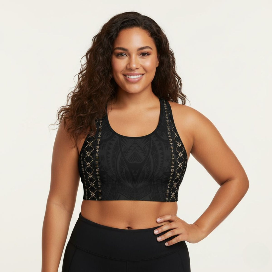Black seamless sports bra by FYBY, Malu collection, featuring subtle stitching and comfortable fit for active wear.