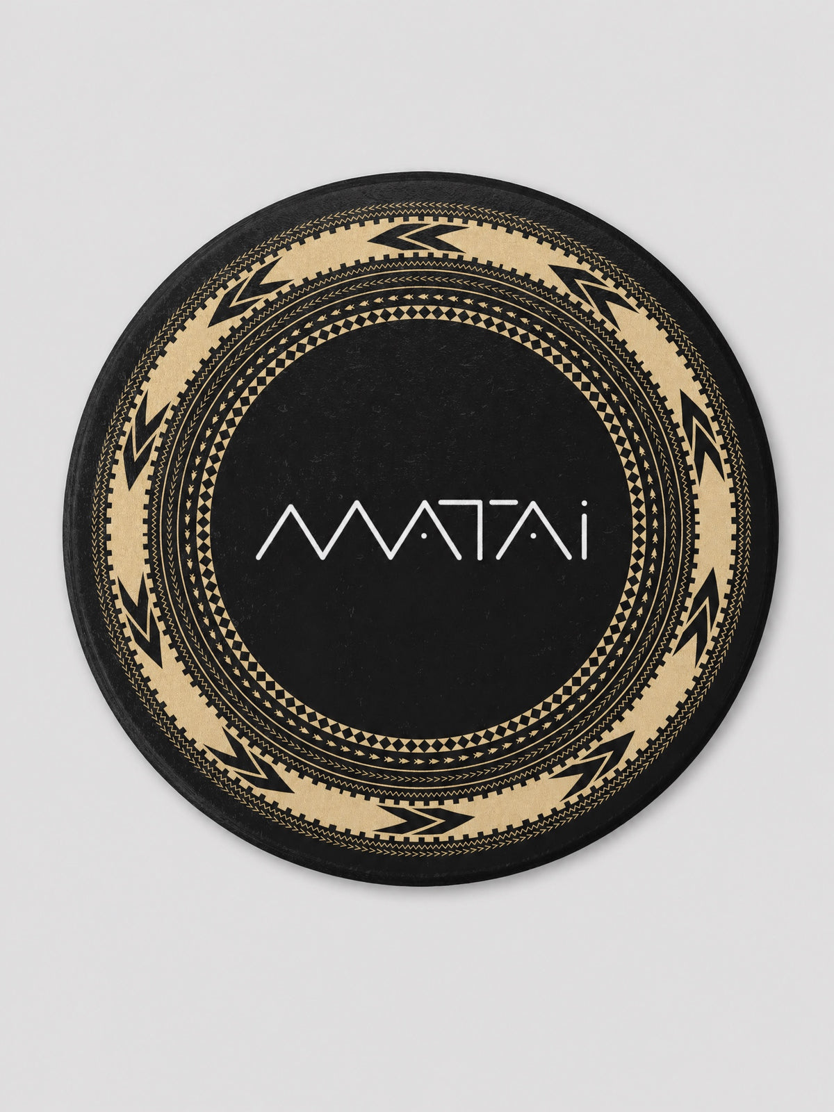 Coasters - Matai Pe'a on a light grey studio background