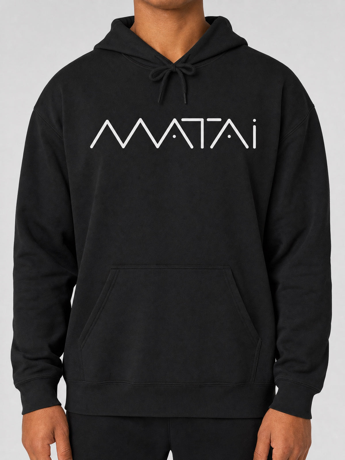 Island Hoodie™ – Matai on a light grey studio background