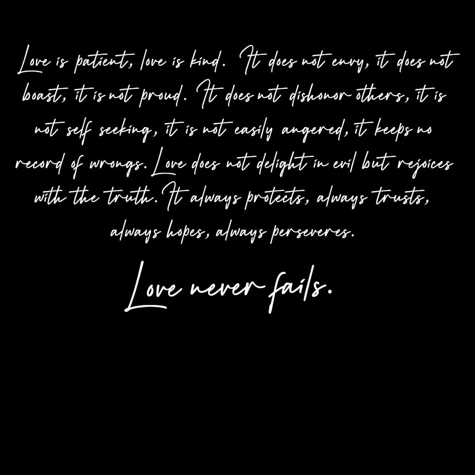 Black Champion unisex sweatshirt by Inkblot featuring "Love Never Fails" design, casual and comfortable for everyday wear.