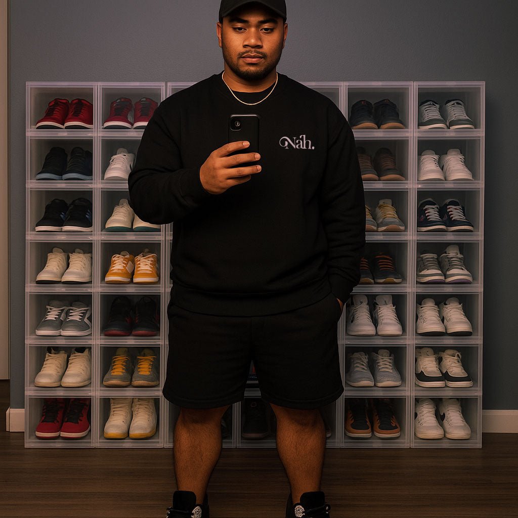 Black Inkblot Champion unisex sweatshirt with relaxed fit, featuring the brand logo on the front, suitable for casual wear.