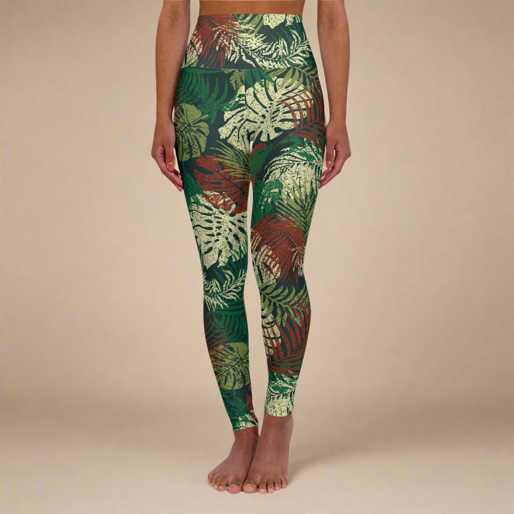 High-waisted leggings in Tafatafa Greens with a vibrant tropical print, designed for comfortable fit.