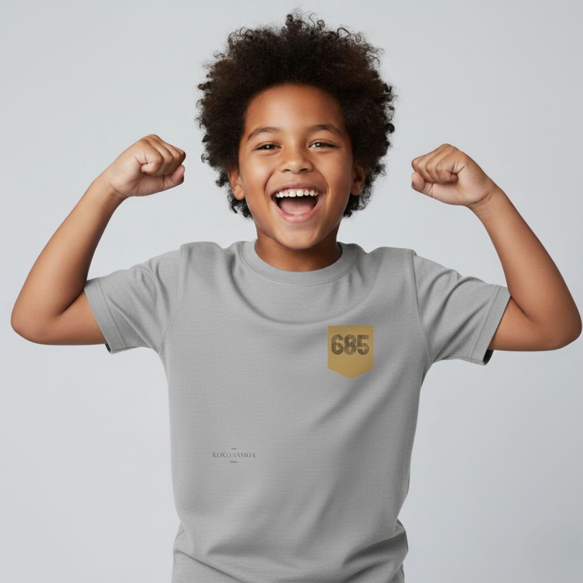 Kids unisex navy T-shirt with monster digital print and chest pocket, from The Print Bar's Kids Tees collection.