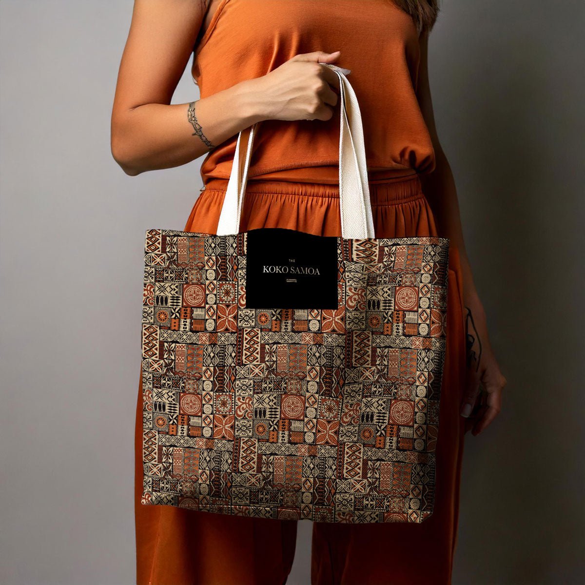 Black Elei tote bag by MWW on Demand, 13x13-inch canvas tote with sturdy handles, perfect for everyday use.