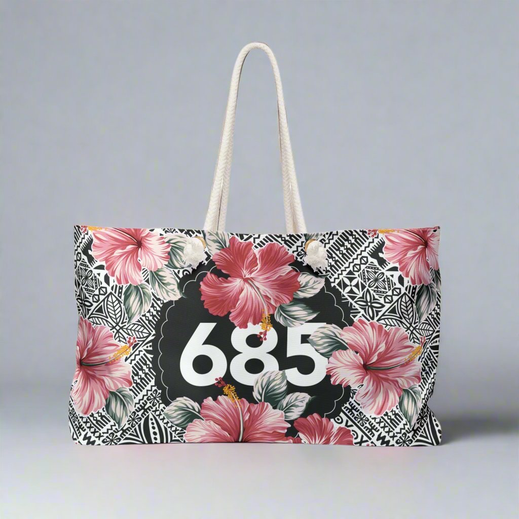 Weekender Bag 685 Aute in neutral fabric with leather accents, 24x13 inches, suitable for travel to AU, NZ, and USA.