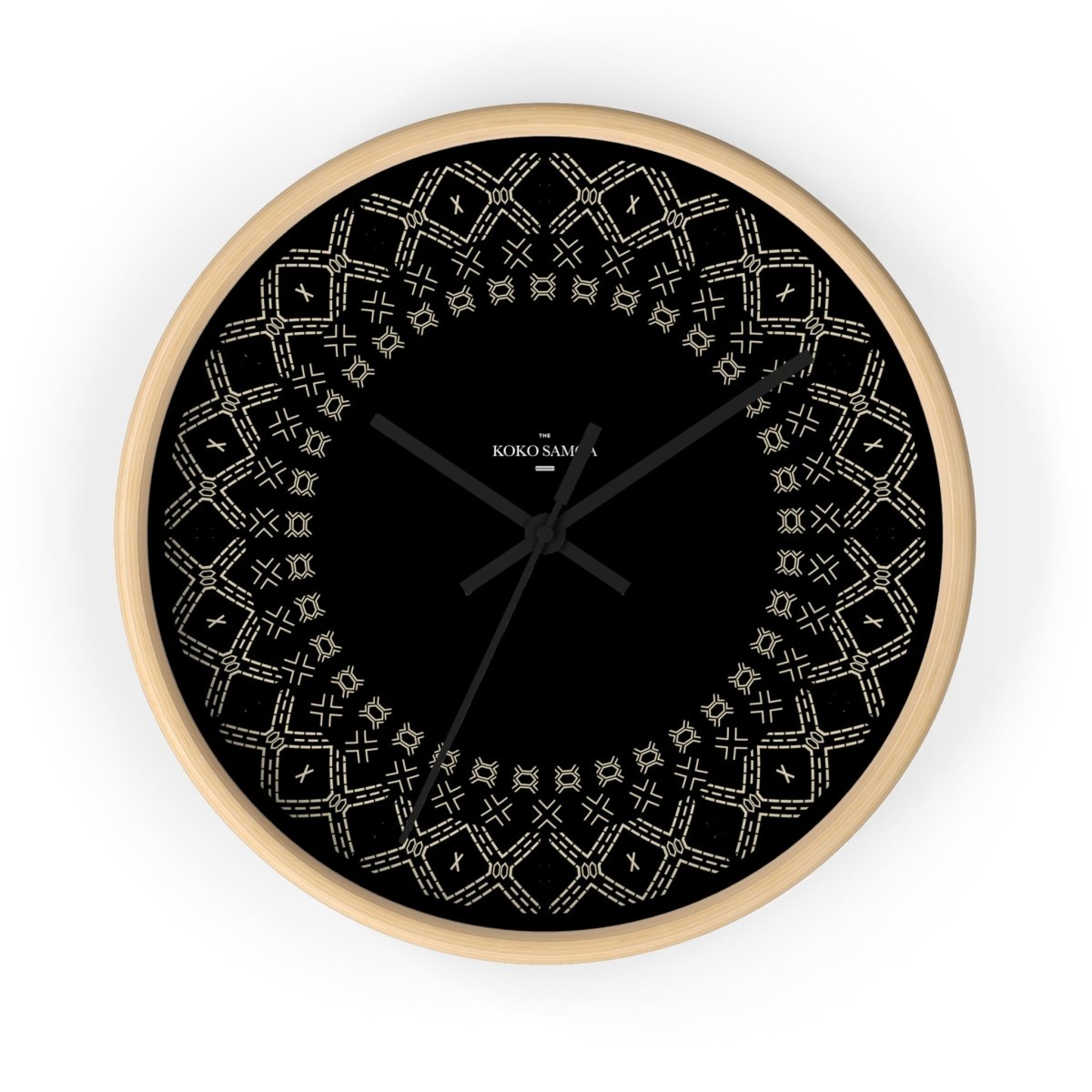 Black Spoke Malu 10-inch wall clock with white face, featuring simple black hands and numbers, suitable for AU, NZ, and US settings.