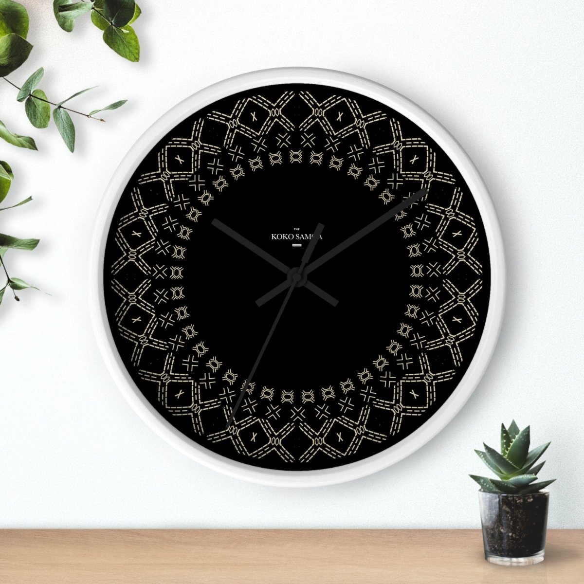 Black Spoke Malu 10-inch Wall Clock with white face and black hands, suitable for AU, NZ, and US settings.