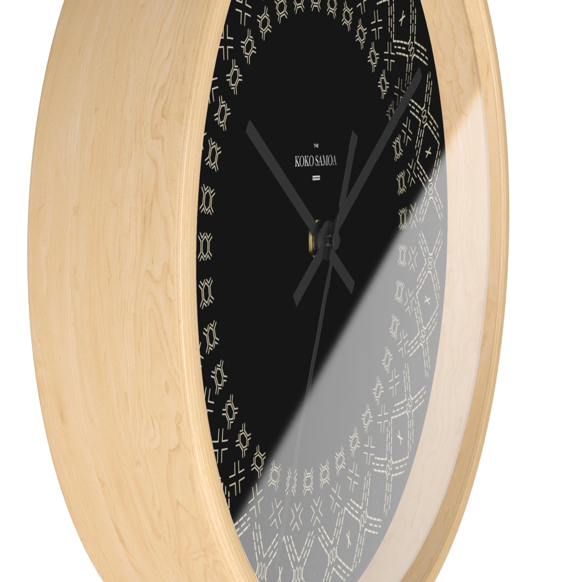 Black Spoke Malu 10-inch wall clock with white face and bold black hands, suitable for AU, NZ, and US wall decor.