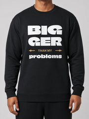 Unisex Heavy Sweatshirt - Bigger Than Problems on a light grey studio background