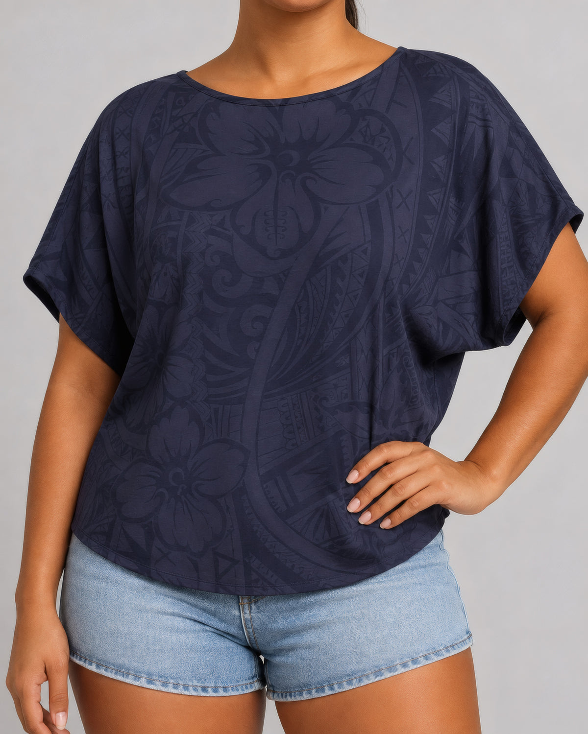 Dolman Tee - Blue Bloom on a light grey studio background