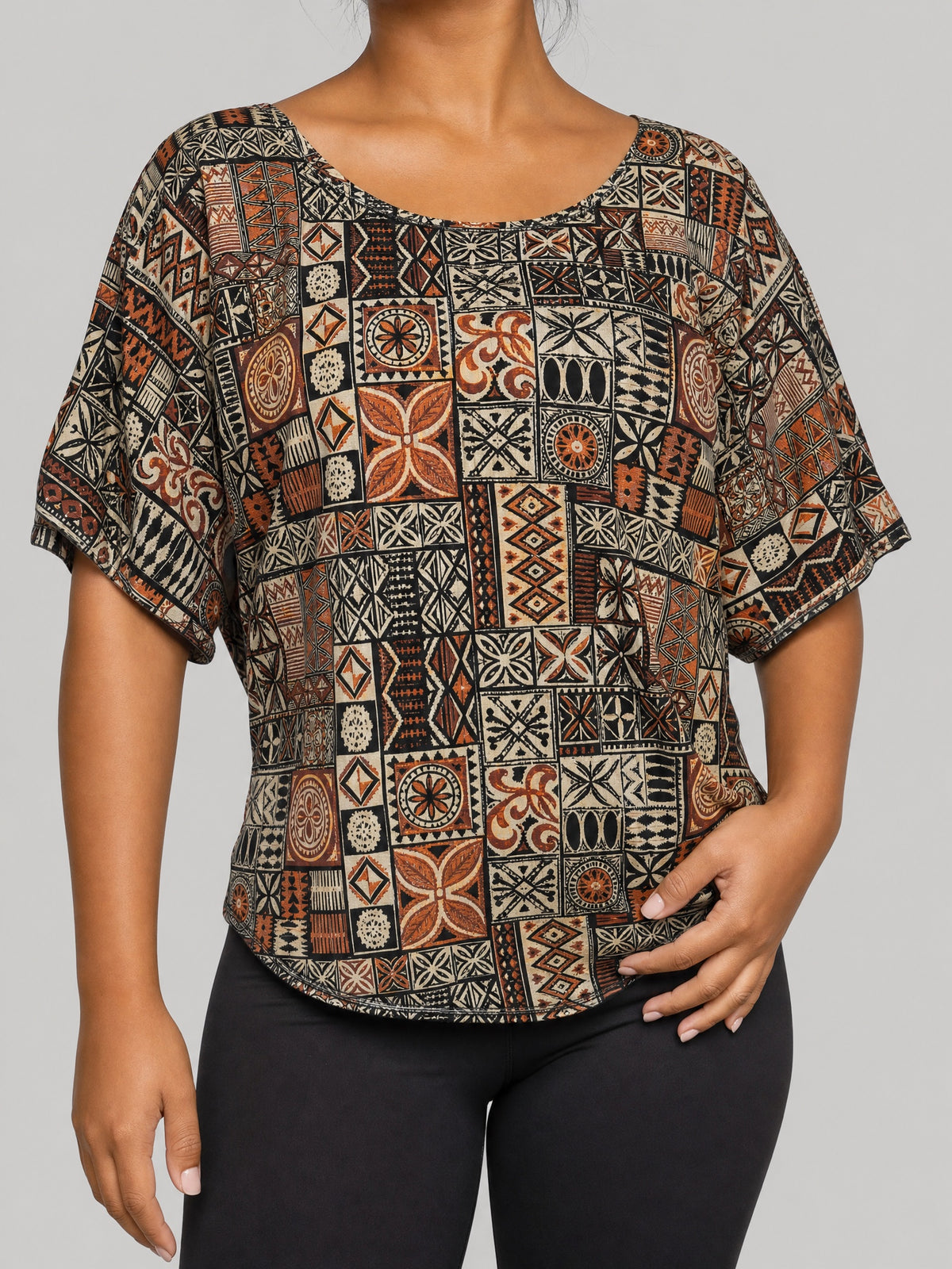 Dolman Tee - Elei on a light grey studio background