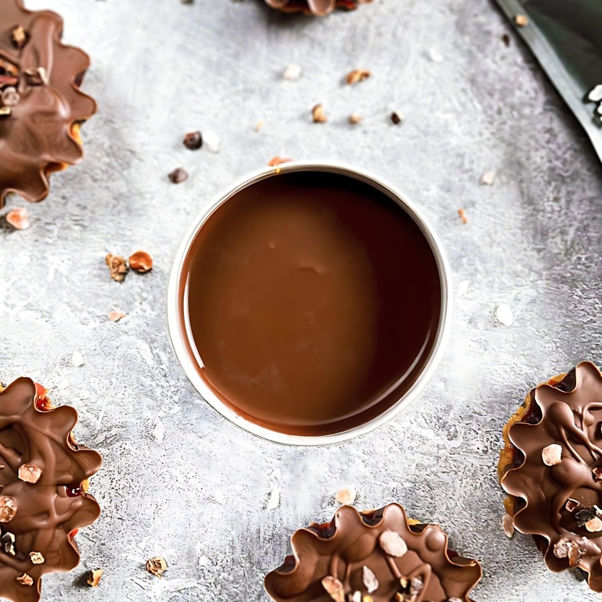 Instant Koko Samoa drinking chocolate by THE KOKO SAMOA, creamy cocoa powder in a canister, ready for making hot chocolate.