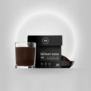 A cup of Instant Koko Samoa drinking chocolate from THE KOKO SAMOA, featuring rich, creamy chocolate in a mug, ready to enjoy.