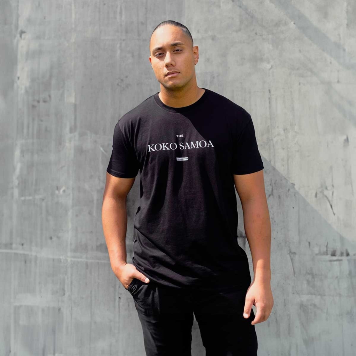 Black heavy unisex tee with the The Brand Classic print, The Koko Samoa