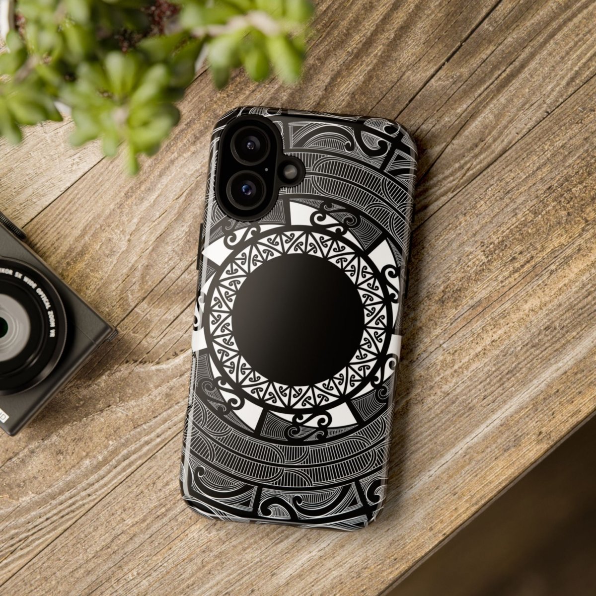 Durable WOYC Māori tough phone case with Māori and Samoan designs for AU, NZ, and US models, showing vibrant artwork on the case.
