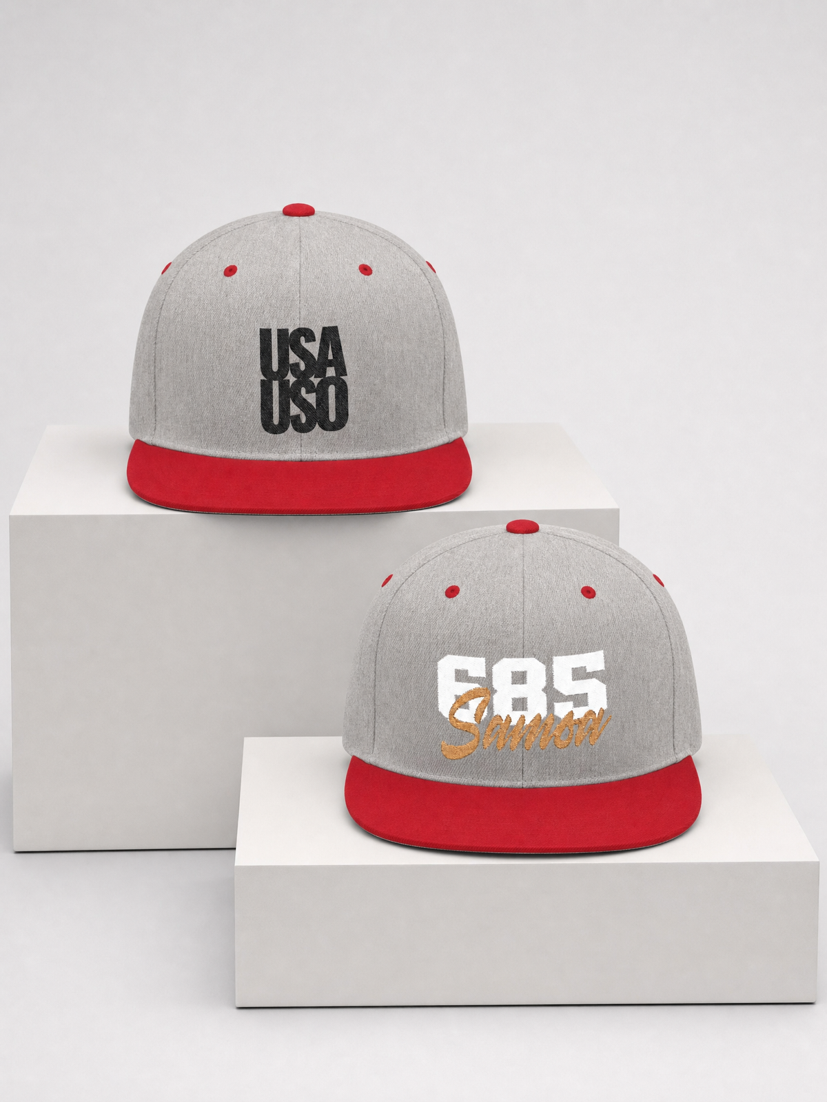 Lua Caps gift set: Flat Bill Snapback Hat - USAUSO - Black Embroidery and Flat Bill Snapback Hat - 685 Samoa - White & Gold Embroidery, shown together.