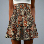 Women's Elei print skater skirt with vibrant tropical pattern, flowing fabric, perfect for casual or summer wear.